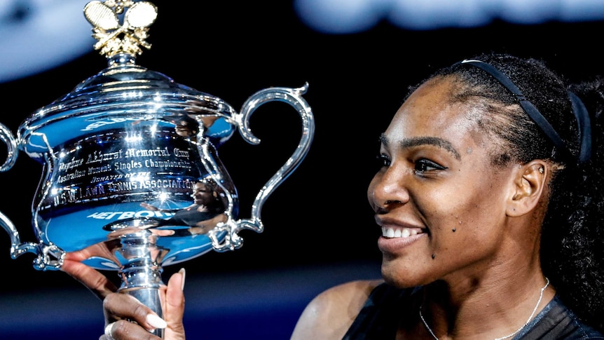 Serena Williams hols the Australian Open trophy