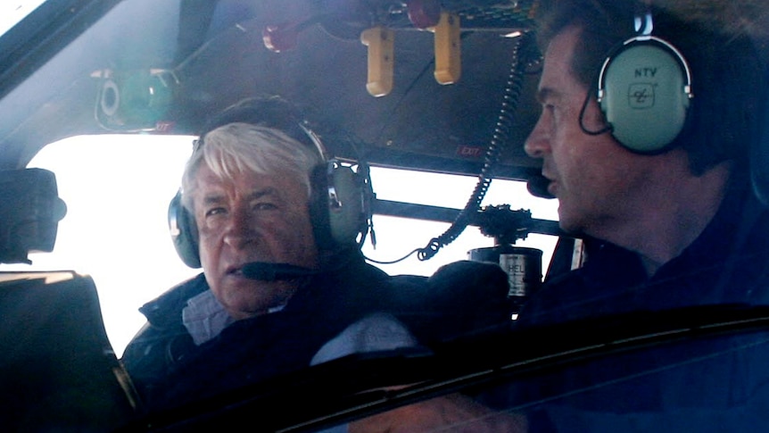 Gary Ticehurst and Paul Lockyer in the ABC helicopter