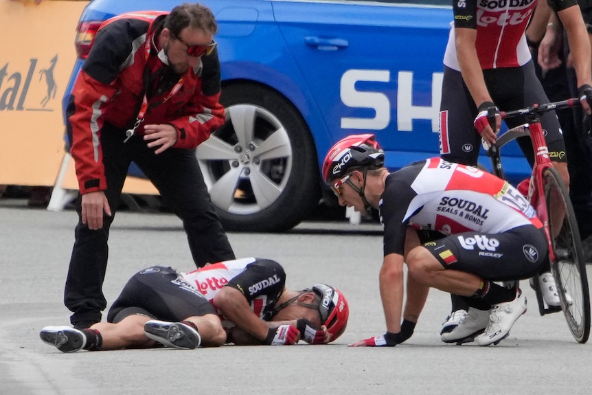 Caleb Ewan lies on the ground