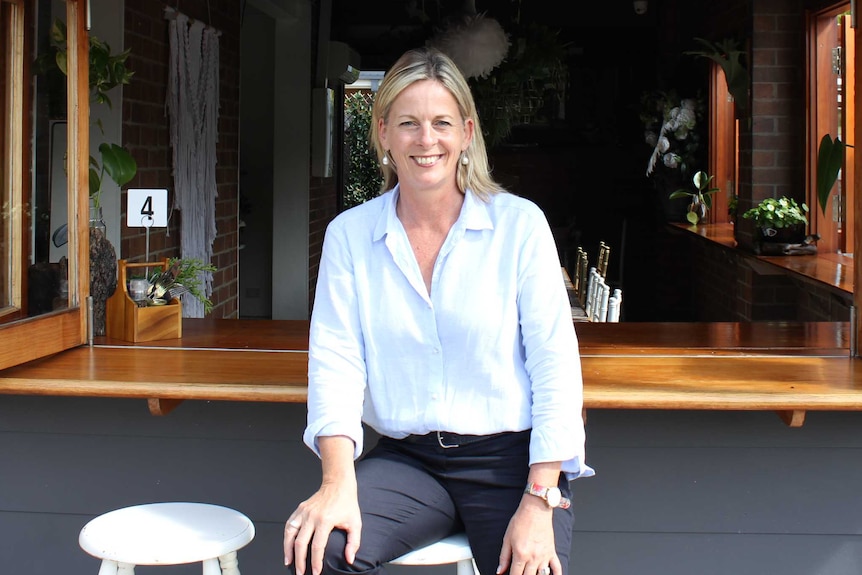 Angie Bell sits at a Highland Park cafe, during a day of Federal election campaigning.