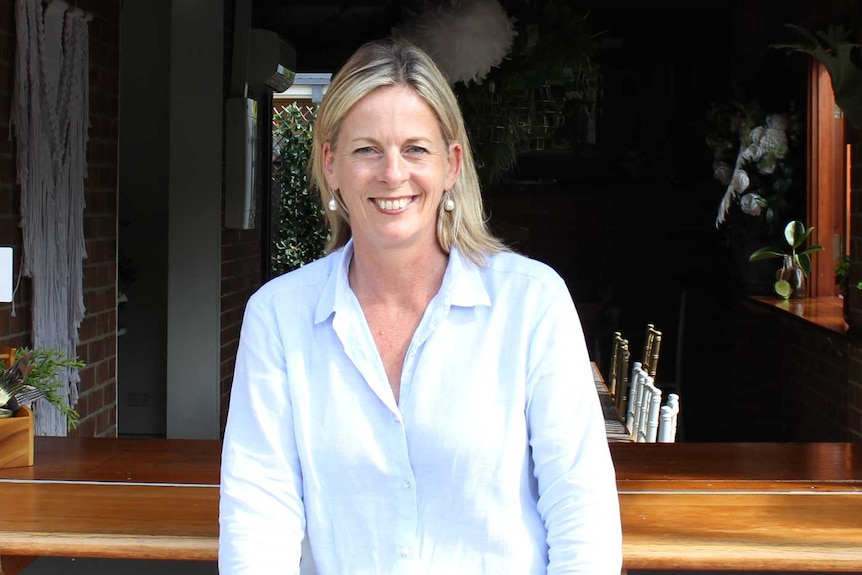 Angie Bell sits at a Highland Park cafe, during a day of Federal election campaigning.