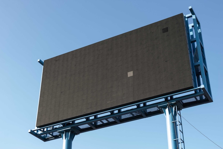 A huge blank digital billboard to depict a story about ways to avoid online impulse shopping.
