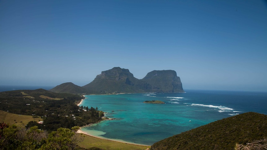 A long view of Lord Howe Island with fringing coral reef.