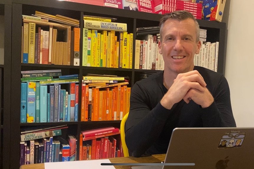 Steve Sammartino sitting at his desk. 