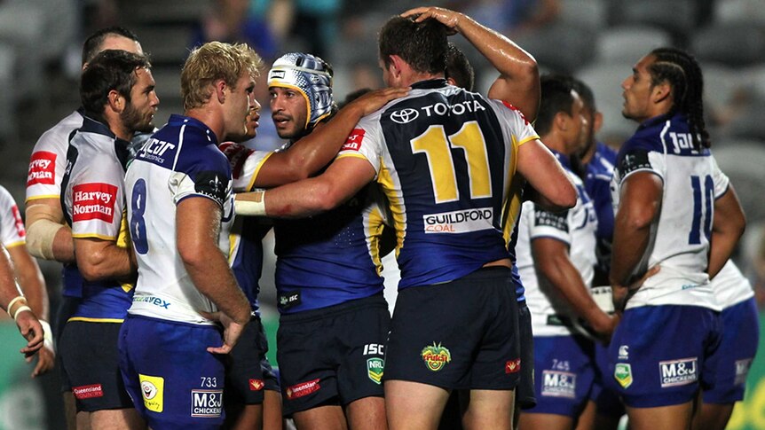 Cowboys celebrate after try against Bulldogs