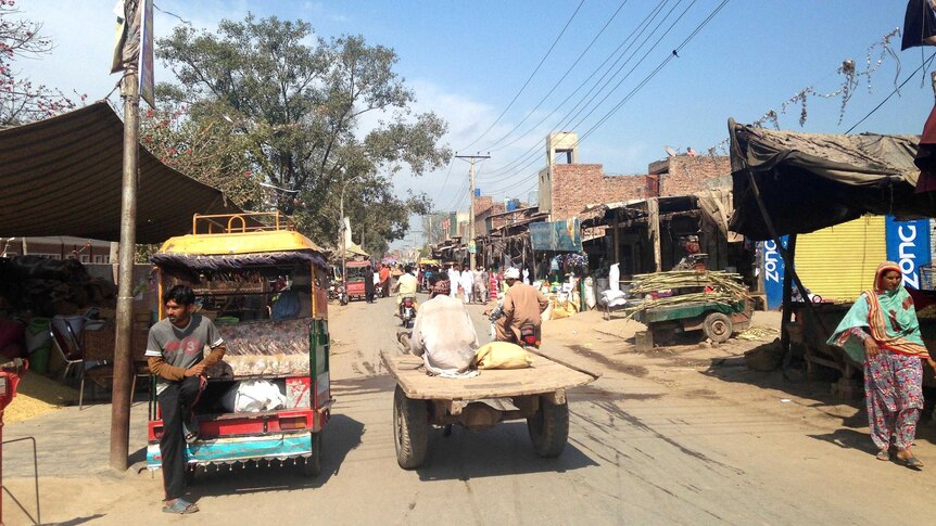 View down a street in the village of Noor Shah.