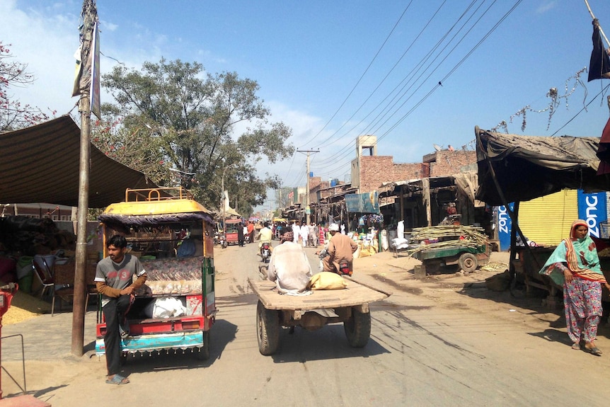 View down a street in the village of Noor Shah.