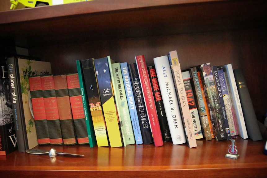 A collection of books on the shelves in Nationals MP Andrew Broad's office.