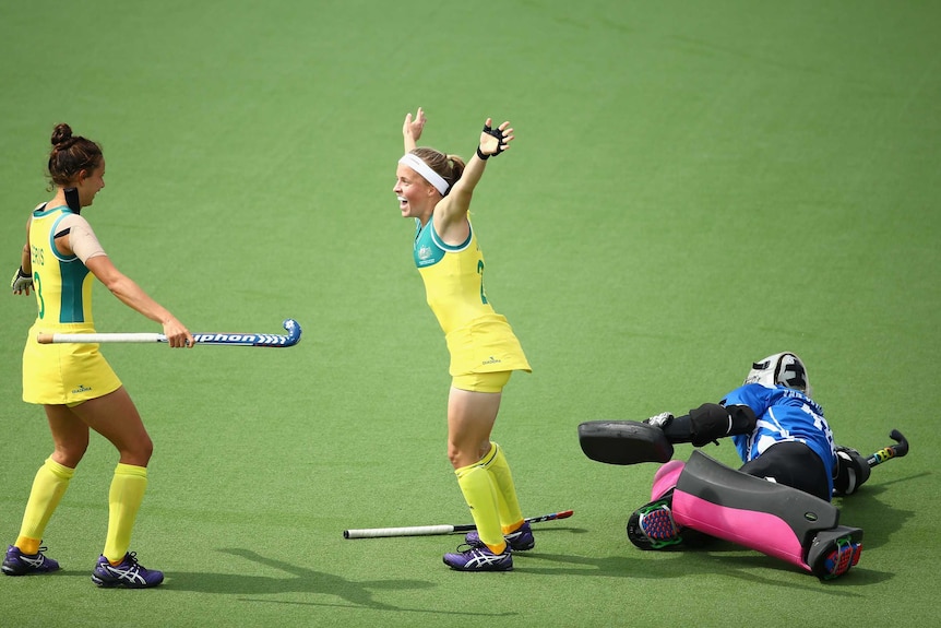 Australia's Emily Smith celebrates after scoring against South Africa in their semi-final.