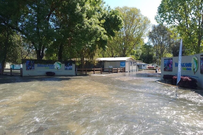 A caravan park inundated with flooding water 
