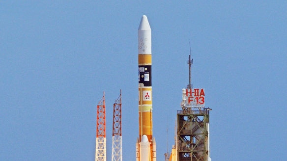 Lift-off: The rocket carrying the orbiter was launched off the tiny island of Tanegashima.