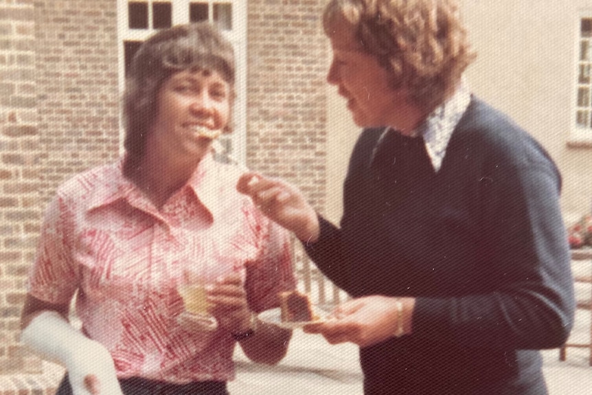 Thompson with her arm in plaster standing next to Lorraine Hill.