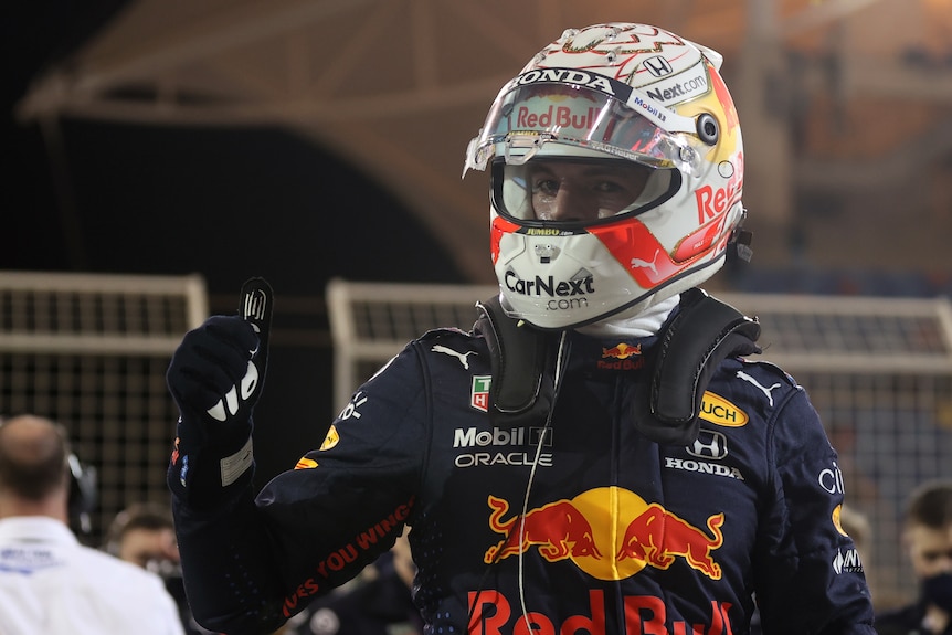 Red Bull's Max Verstappen celebrates after qualifying in pole position.