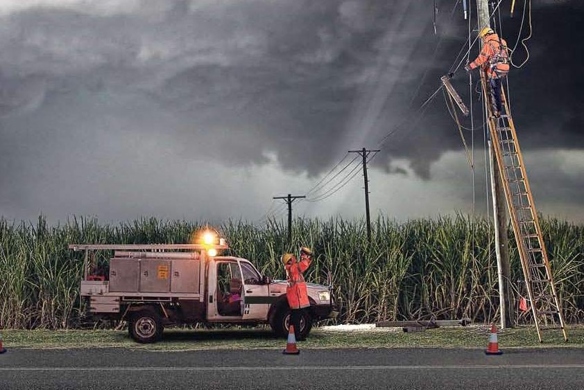 Essential Energy crew working on power network during storm