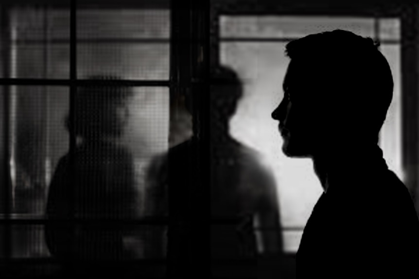 Silhouettes of three people.