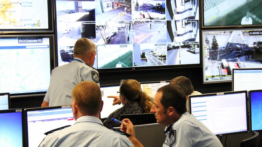 Police at work in the G20 Operations Centre at the Queensland Police HQ at Roma Street, Brisbane.