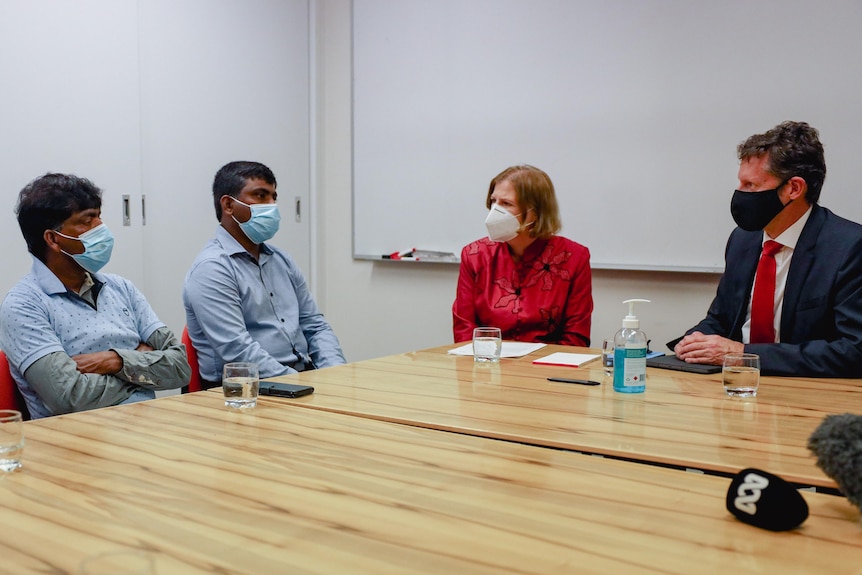 Four people in a room