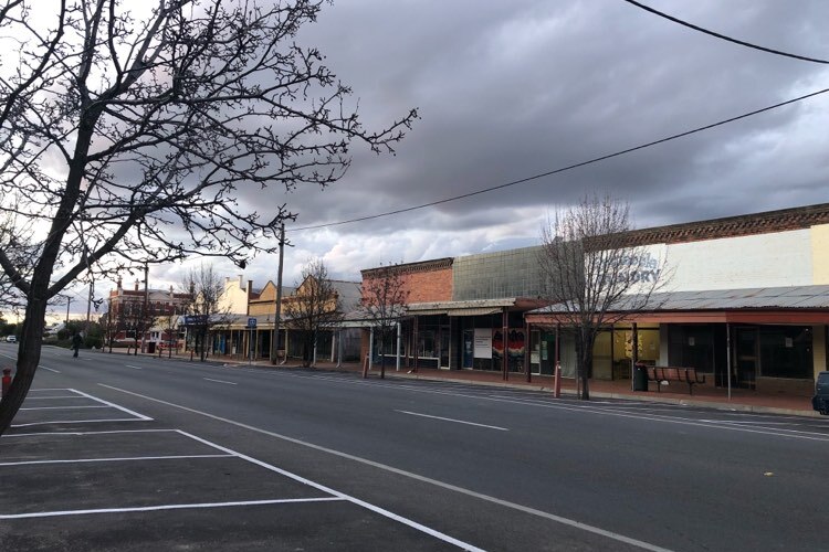 A row of old shops during lockdown in regional Victoria on a grey day