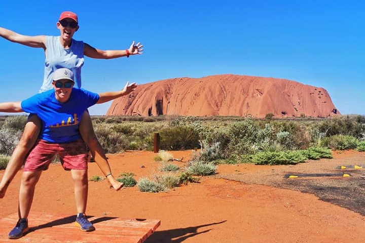 Two people at Uluru.