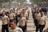 Iraqi police trainees practice marching