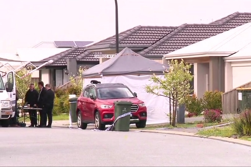 A forensic tent in a residential suburb