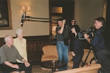 Helen Grasswill, cameraman and sound recordist filming Archbishop Peter Hollingworth and wife Ann.