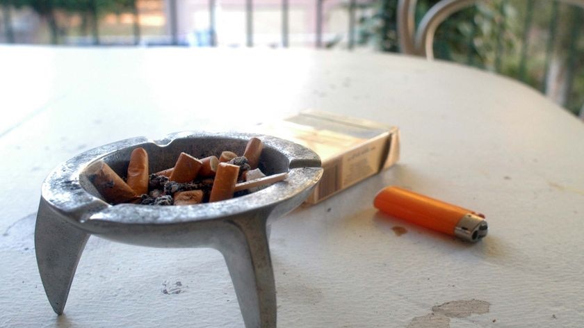 An ashtray, cigarettes and a lighter on a table (ABC News)