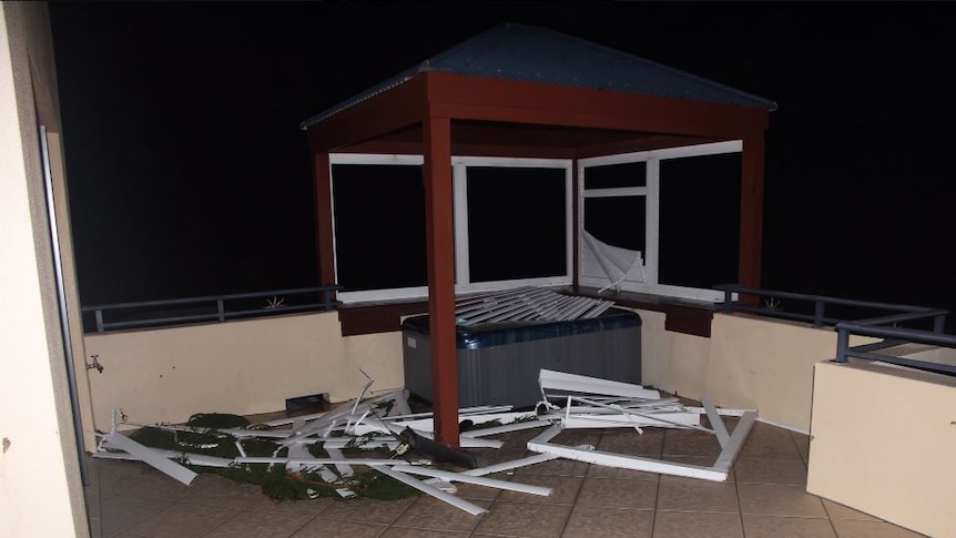 A jacuzzi tub is seen with debris strewn around it in airlie beach