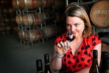 Hanging Rock winery general manager Ruth Ellis drinking a glass of red wine
