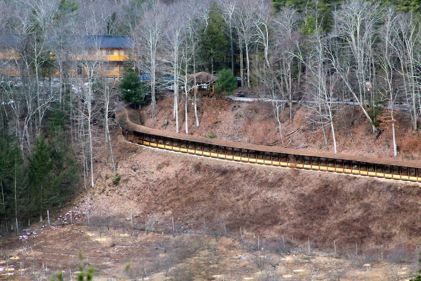 A covered walkway through Dragon Springs.