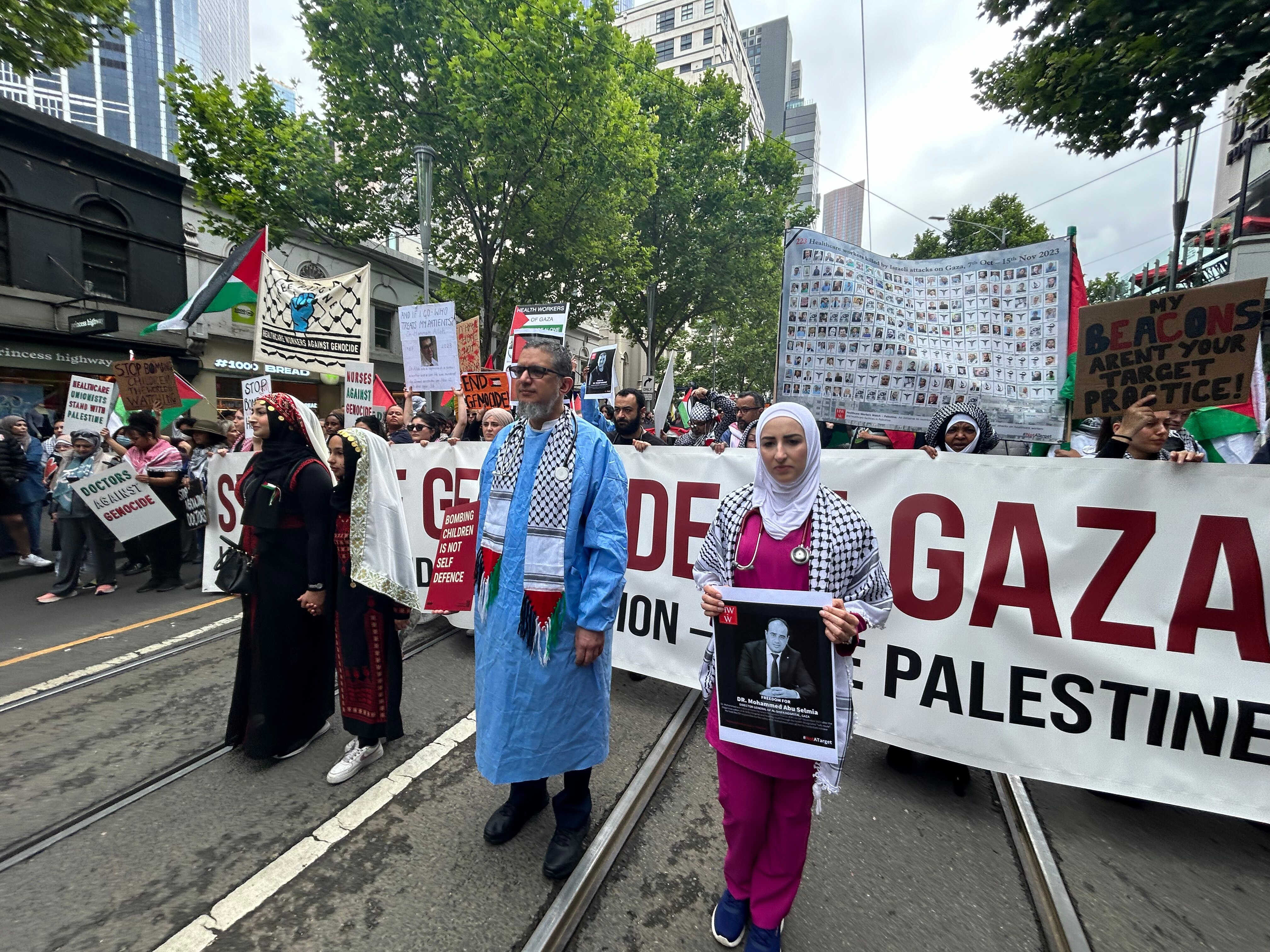 pro-palestinian protesters rally in melbourne's cbd on sunday 26 november 