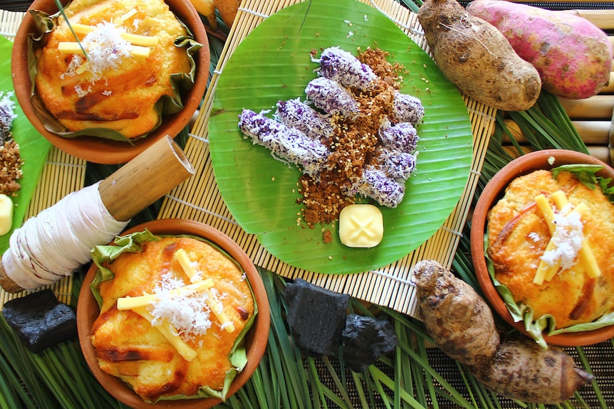 Filipino Christmas treats bibingka (left and right) and puto bumbong (centre)