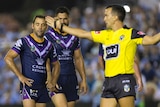 Melbourne Storm captain Cameron Smith looks frustrated as a referee blows a pently