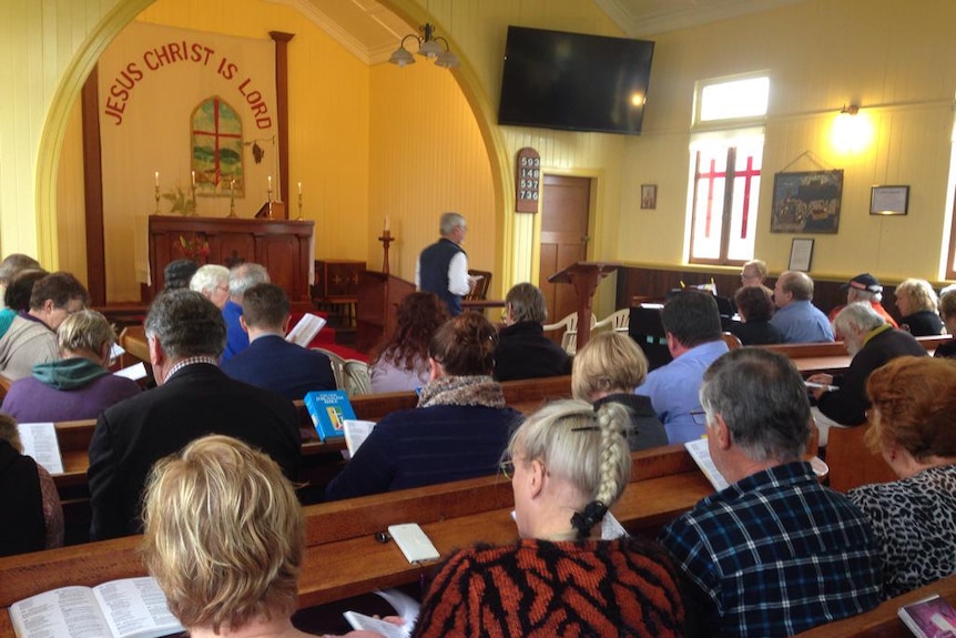 Ravenshoe community gather to pray for victims of Serves You Right Cafe blast