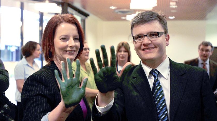 Prime Minister Julia Gillard and local member Darren Cheeseman display green hands