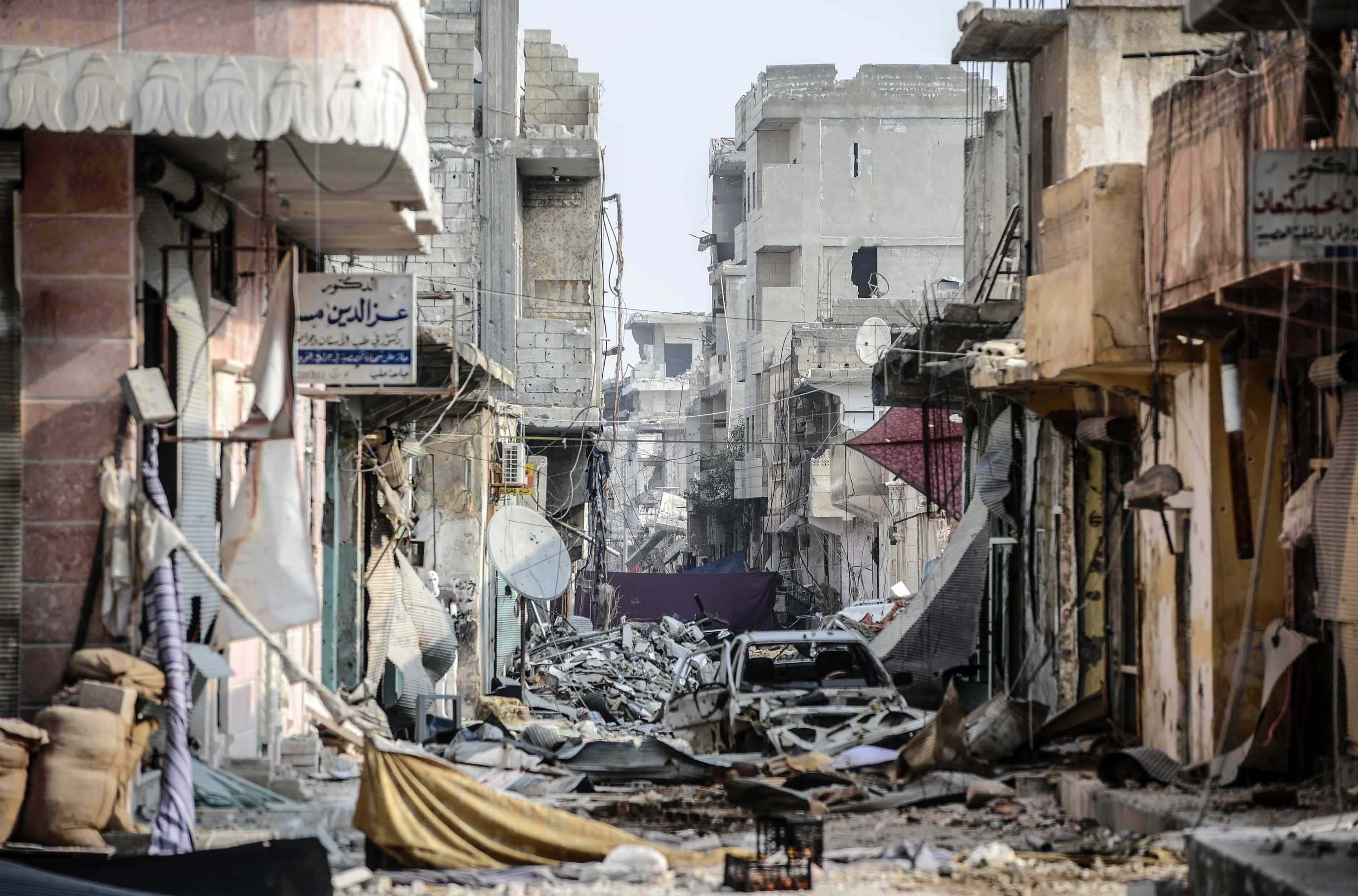 Syria crisis: Massive destruction revealed in Kobane after Kurds drive ...