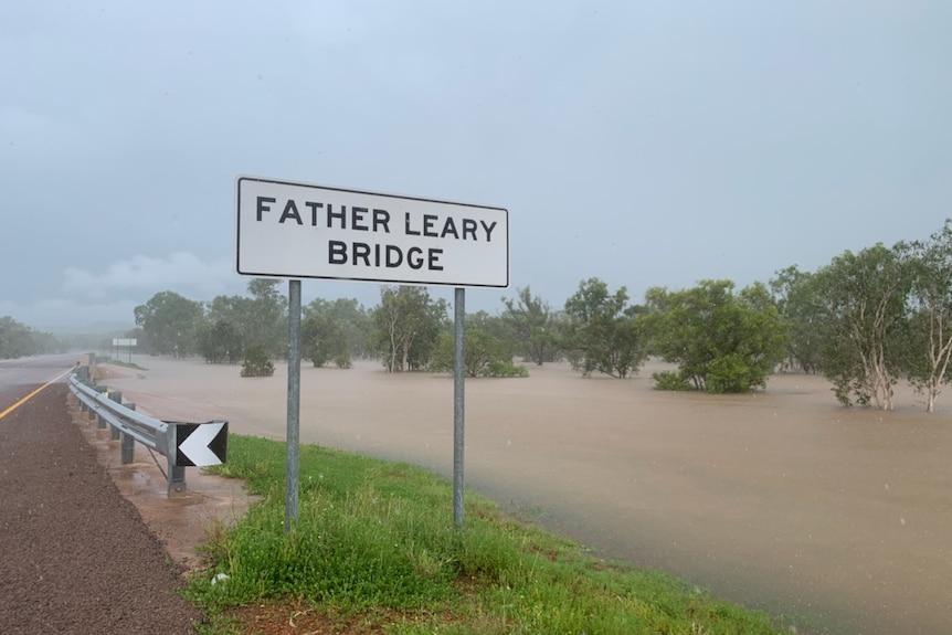 A bridge in the Daly River is close to flooding over.