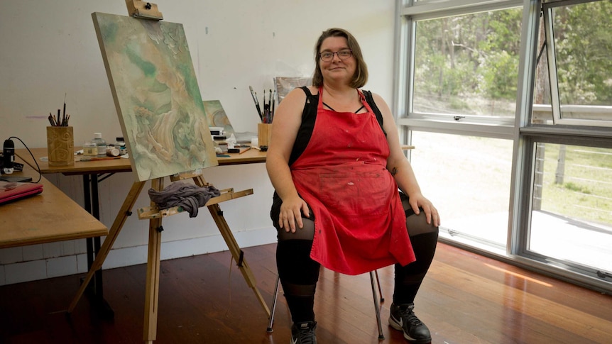 A woman in a studio environment