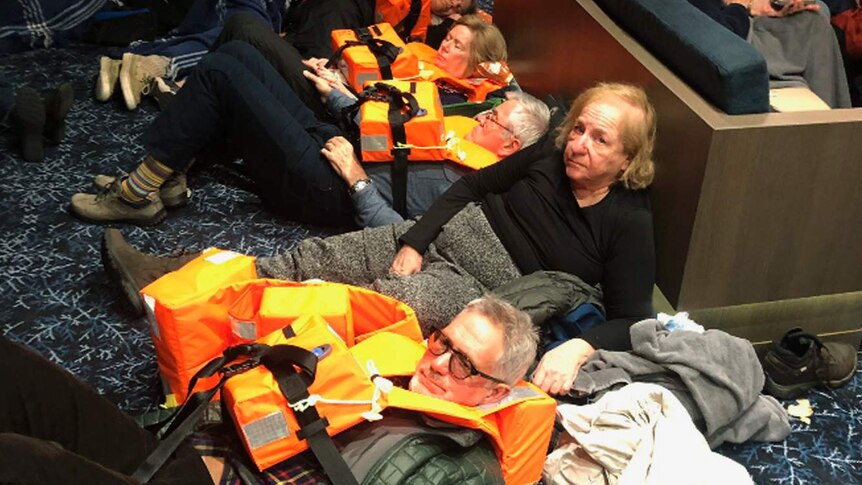 Passengers onboard the Viking Sky, waiting to be evacuated.