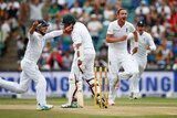 England's Stuart Broad celebrates South Africa's Hashim Amla's wicket in third Test at Wanderers.