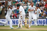 England's Stuart Broad celebrates South Africa's Hashim Amla's wicket in third Test at Wanderers.