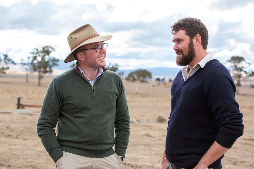 NSW Agriculture Minister Adam Marshall speaking to a farmer in Guyra.