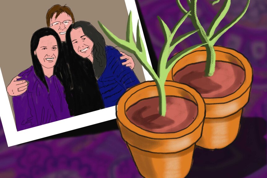 Two daughters and their moth with two pot plants