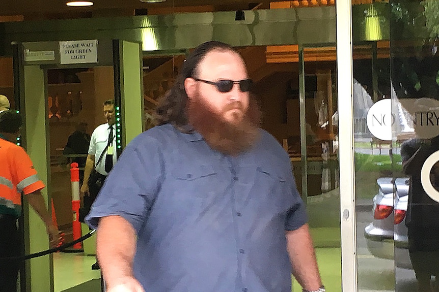 Brenton Kelly Dickson leaving court