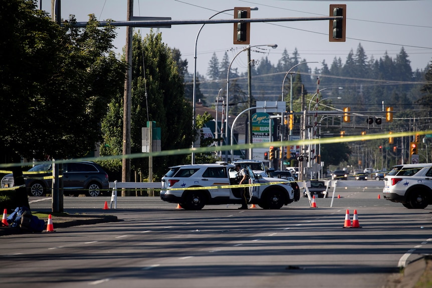 police cars at mass shooting scene in Canadian town