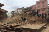 People clear rubble to search for Kathmandu earthquake survivors