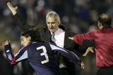 Uruguay coach Jorge Fossati (c) confronts Juan Pablo Sorin of Argentina during World Cup qualifier