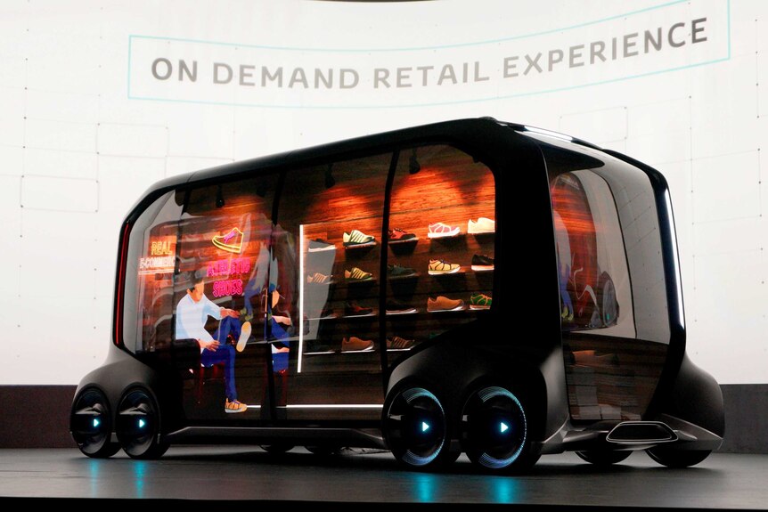 A concept vehicle designed by Toyota. It's a self driving on demand retail mini bus