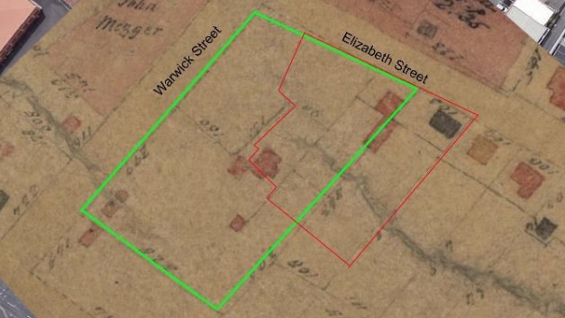 A faded old map showing two overlapping building outlines