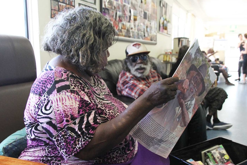 Purple House patients Carol Larrie and Kenny Willliams wait at the clinic.